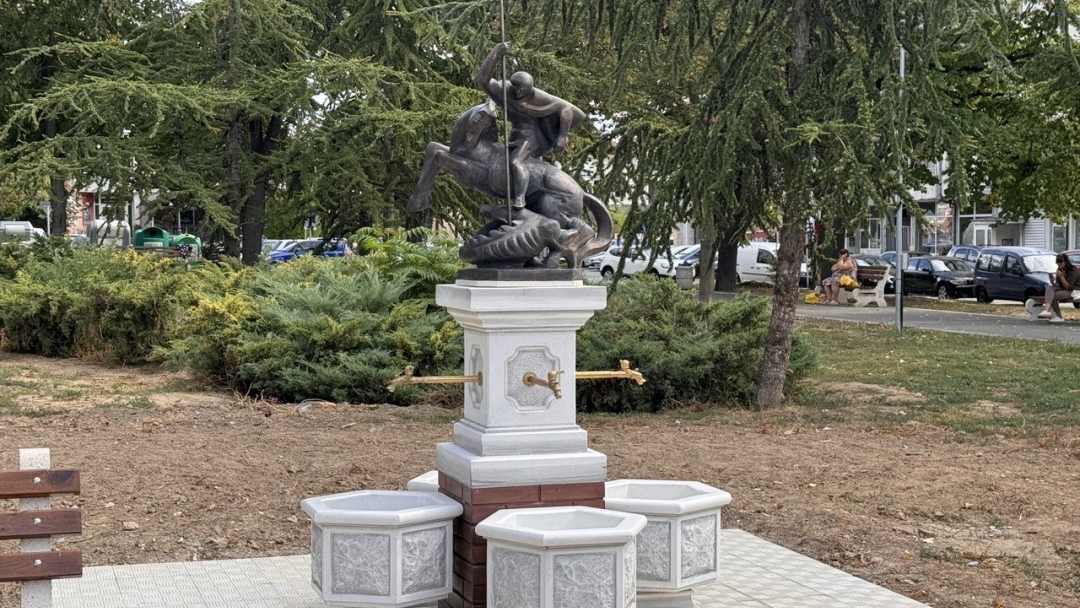 A bronze sculpture of St. George on the new fountain next to Danube Square