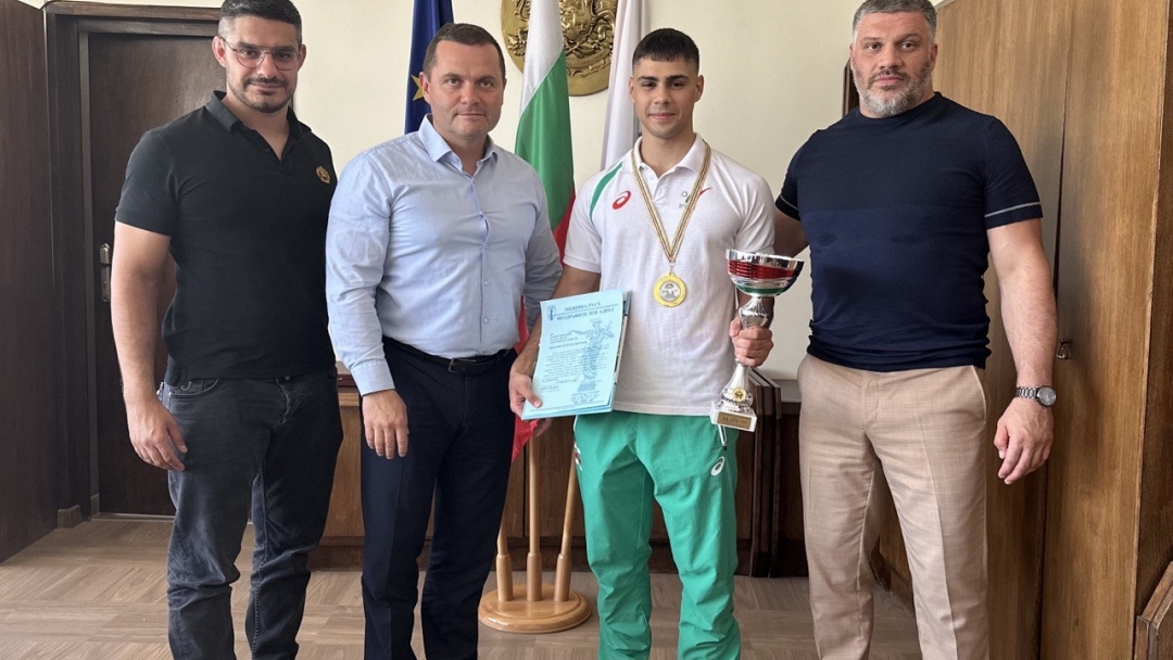 Pencho Milkov awarded the young Ruse karate player Daniel Varbanov for the European title he won