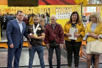 The mayor honored five-time European champion Angel Rusev with a gold "Ruse" badge