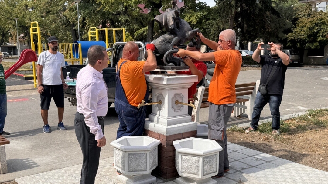 A bronze sculpture of St. George on the new fountain next to Danube Square