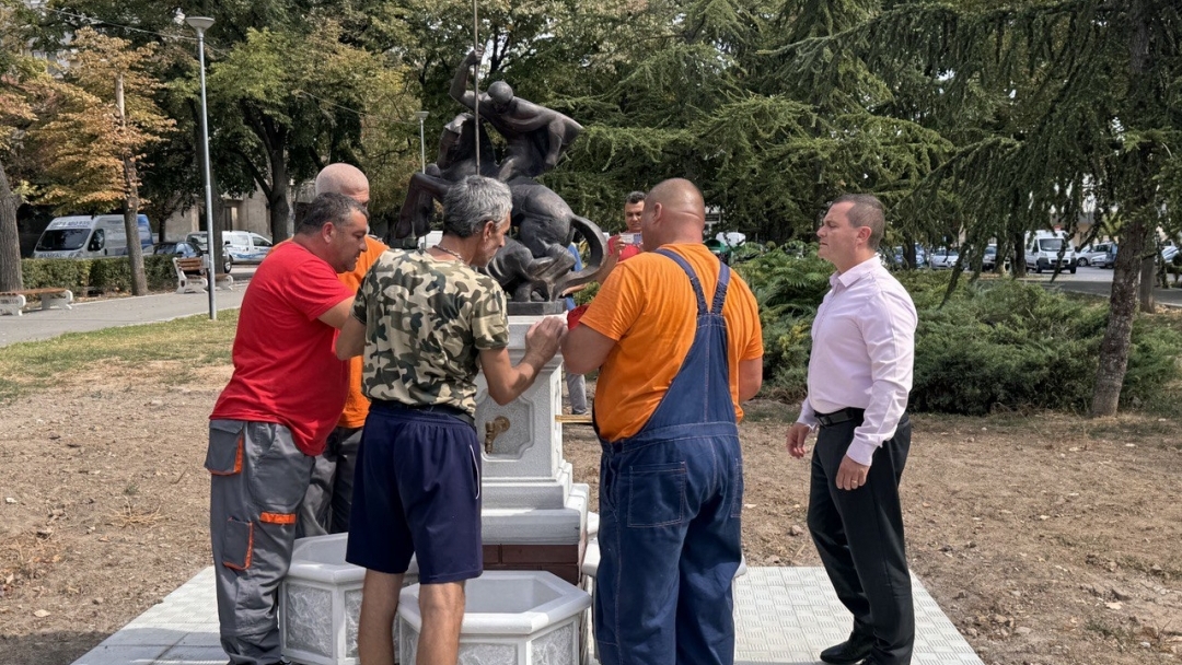 A bronze sculpture of St. George on the new fountain next to Danube Square