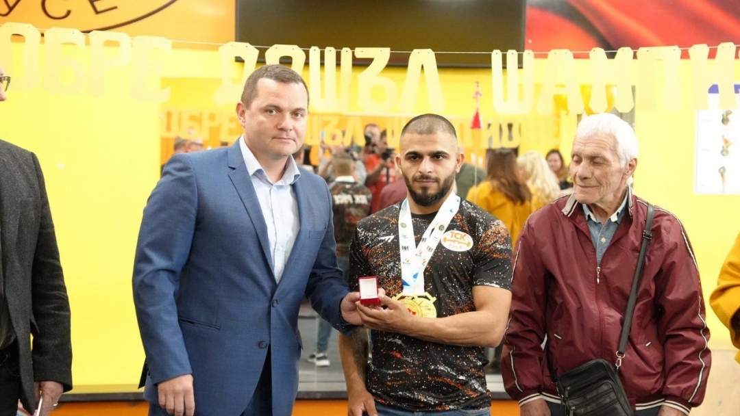 The mayor honored five-time European champion Angel Rusev with a gold "Ruse" badge